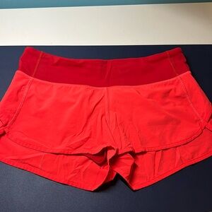 Red Lululemon speed up shorts 2” in very good used condition